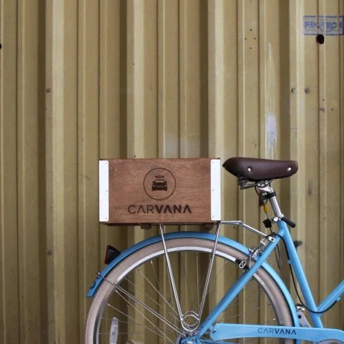 Rear half of Columbia Blue Willow 3 with "Carvana" decal and "Carvana" branded wooden crate